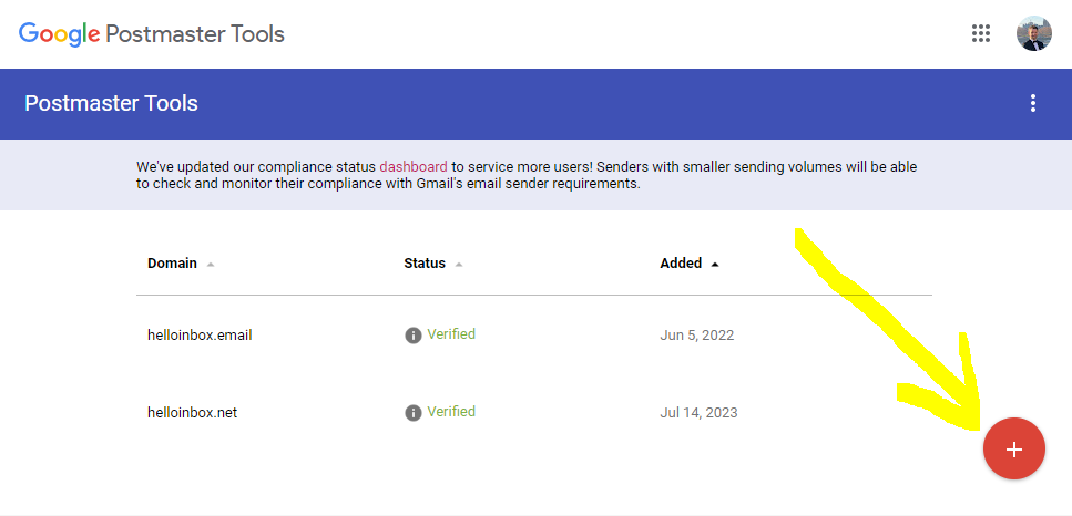 A screenshot of the Google Postmaster Tools interface. Beneath a blue header reading "Postmaster Tools," a table displays two domains with their statuses listed as "Verified." A yellow arrow points to the red plus button at the bottom right, suggesting adding a new domain.