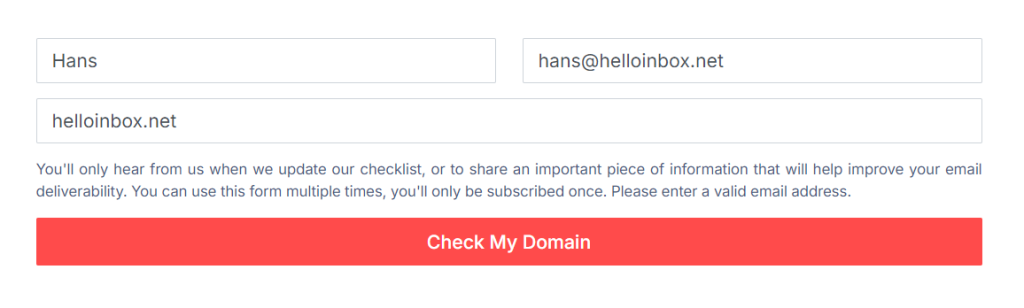 A screenshot of an email subscription form. The form has three fields: a name input field with "Hans," an email input field with "hans@helloinbox.net," and a website input field with "helloinbox.net." Below is text explaining the subscription, and a red button labeled "Check My Domain.